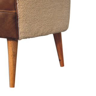 Bouclé-Sessel aus Büffelleder